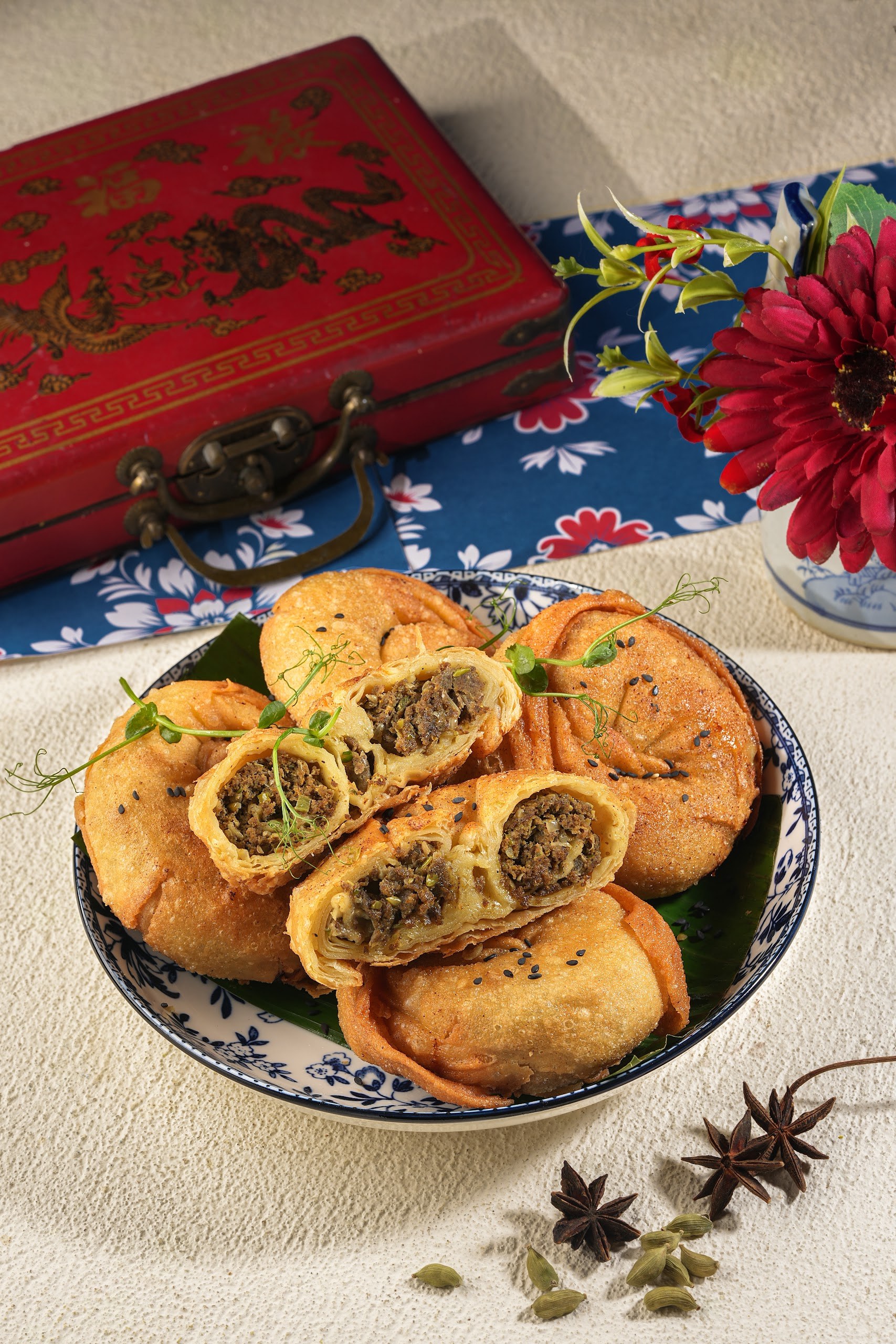 Moon Roti — layered flatbread rolls with spiced beef